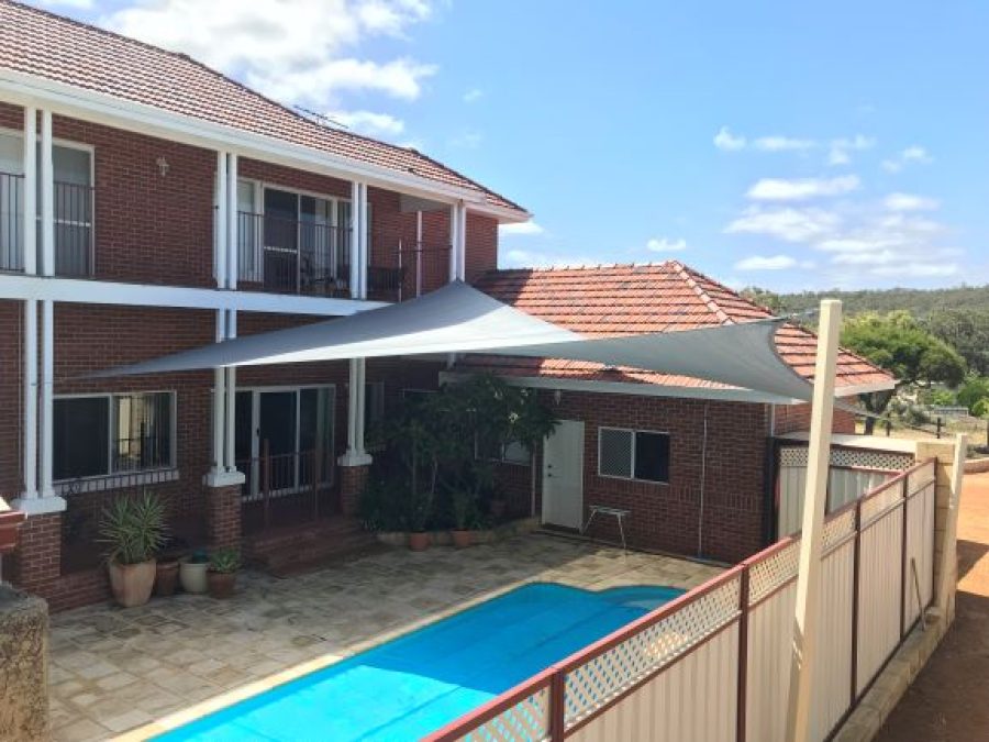 Hypar Shade Sail over pool in Greenmount